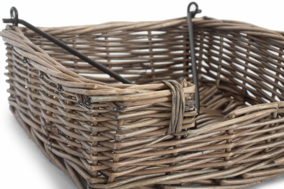 Close-up of the Antique Wash Willow Napkin Holder showing the hinged dark metal napkin weight