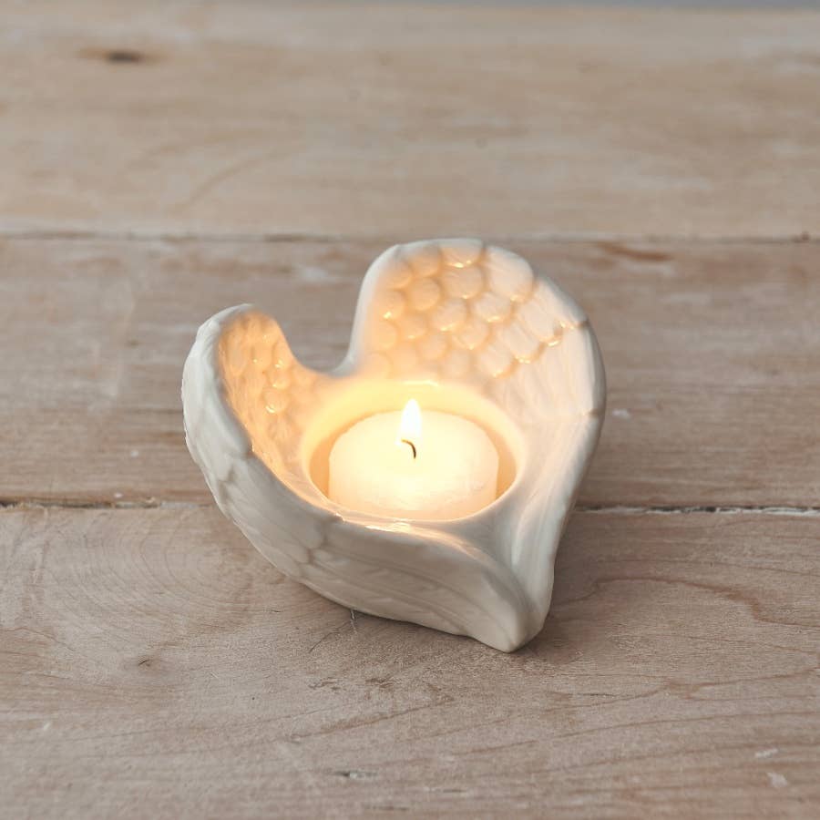 Angel Wing T-Light Holder 9cm in white ceramic with illuminated battery-operated T-light