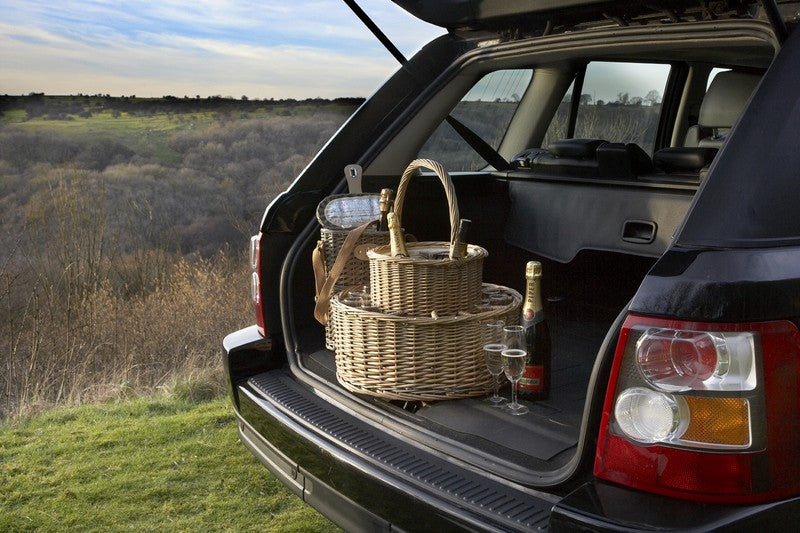 Chilled Garden Party Willow Basket beside an open car boot ready for an outdoor picnic or celebration