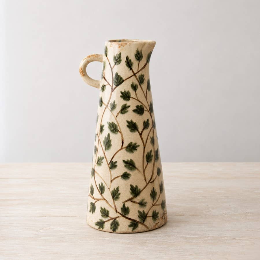Tall ceramic jug vase with green trailing leaf design and crackle glaze, 30.5cm