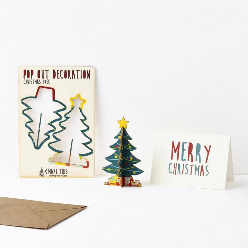 Pop Out Standing Christmas Tree Card showing the flat pop-out design, assembled wooden tree and Merry Christmas message card