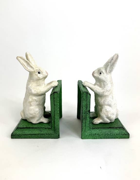 Cast iron antiqued white rabbit bookends with verdigris green bases