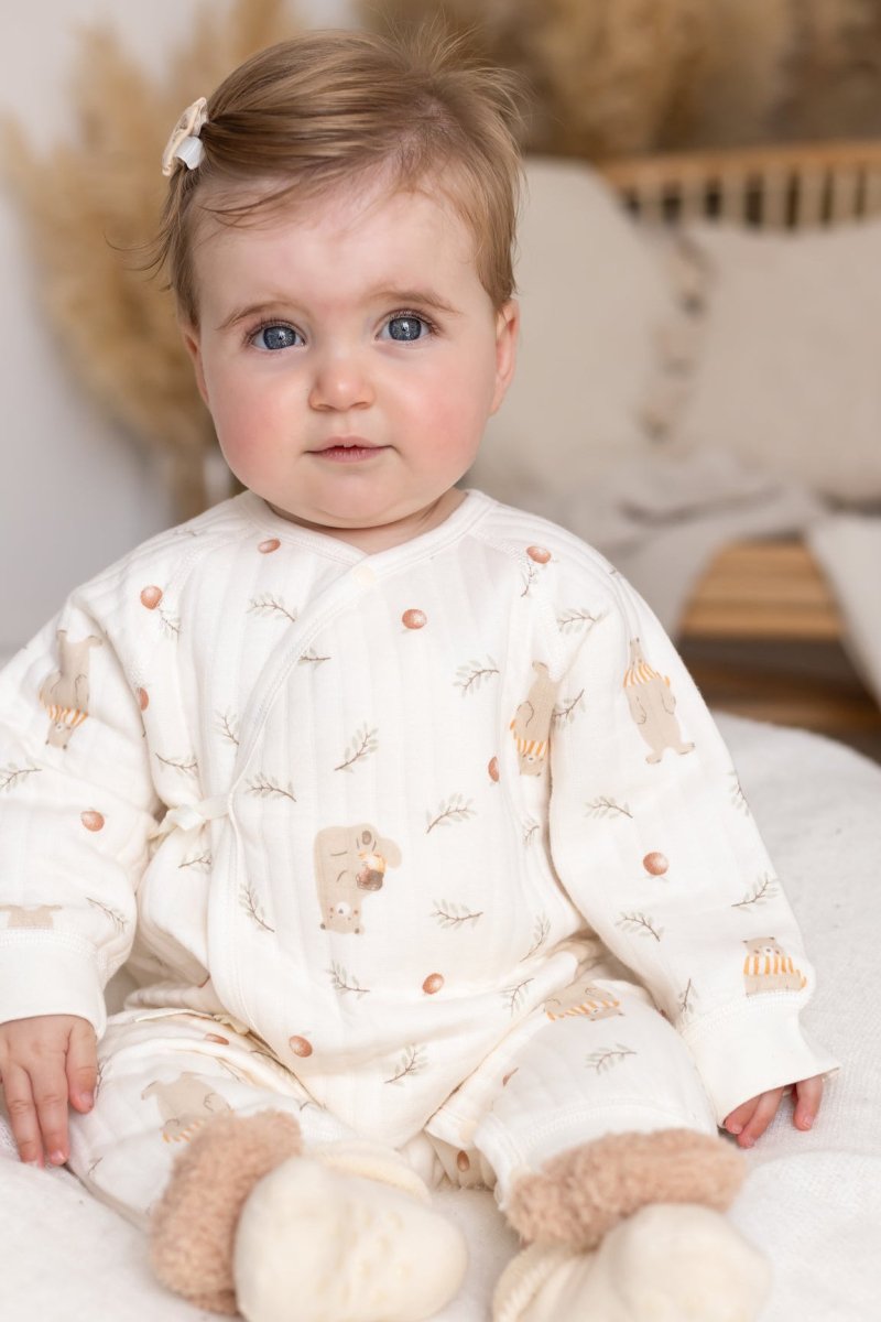 Baby in the Cozy Crew Club Woodland Bear Baby Grow Romper