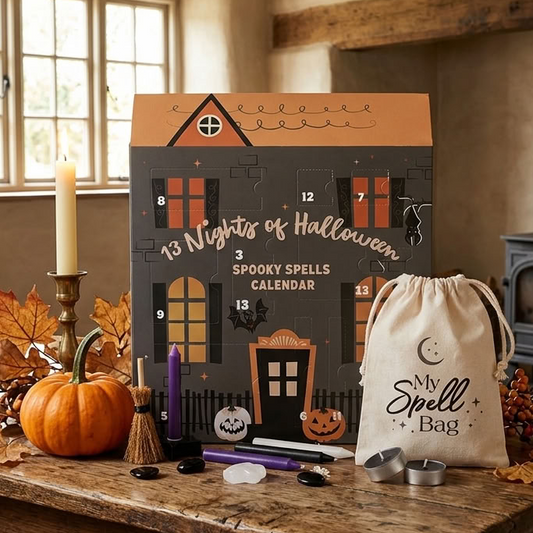 13 Nights of Halloween advent calendar styled with pumpkins, candles and mystical Halloween accessories