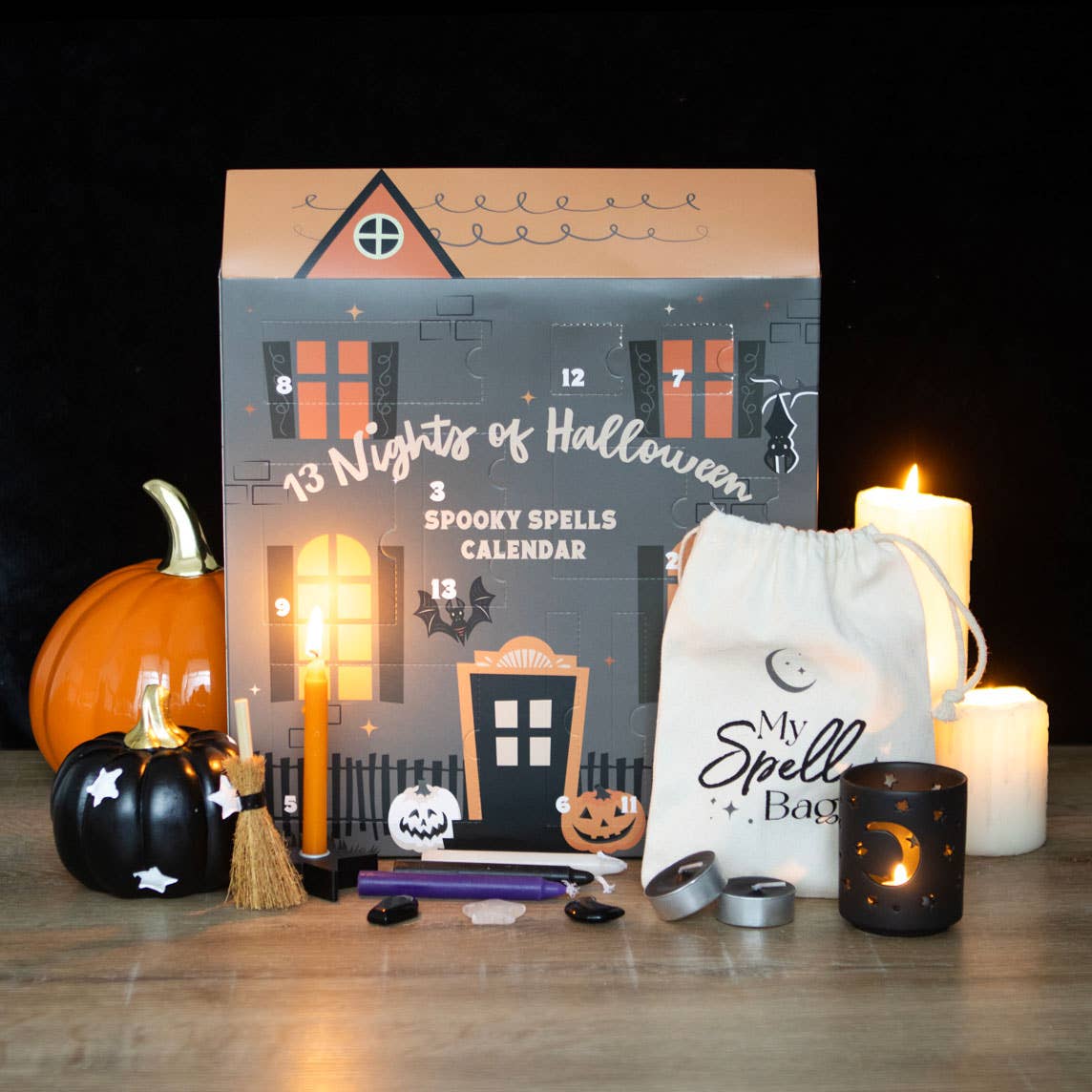 13 Nights of Halloween advent calendar styled with pumpkins, candles and mystical Halloween accessories