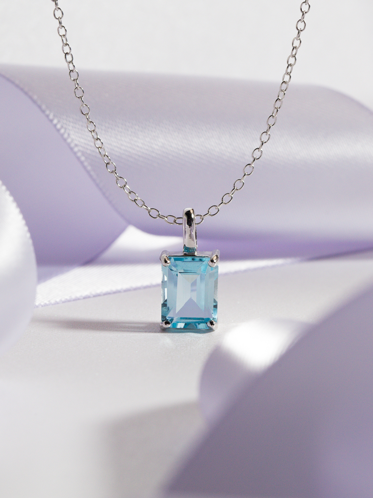 Blue Topaz Emerald Cut Pendant Necklace in Sterling Silver by Vianne Jewellery