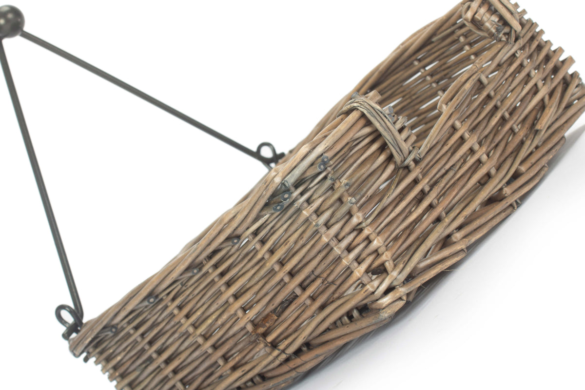 Side view of the Antique Wash Willow Napkin Holder showing its low woven willow construction