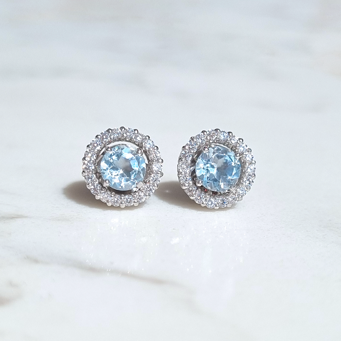 Blue Topaz Halo Stud Earrings with Jackets in Sterling Silver by Vianne Jewellery