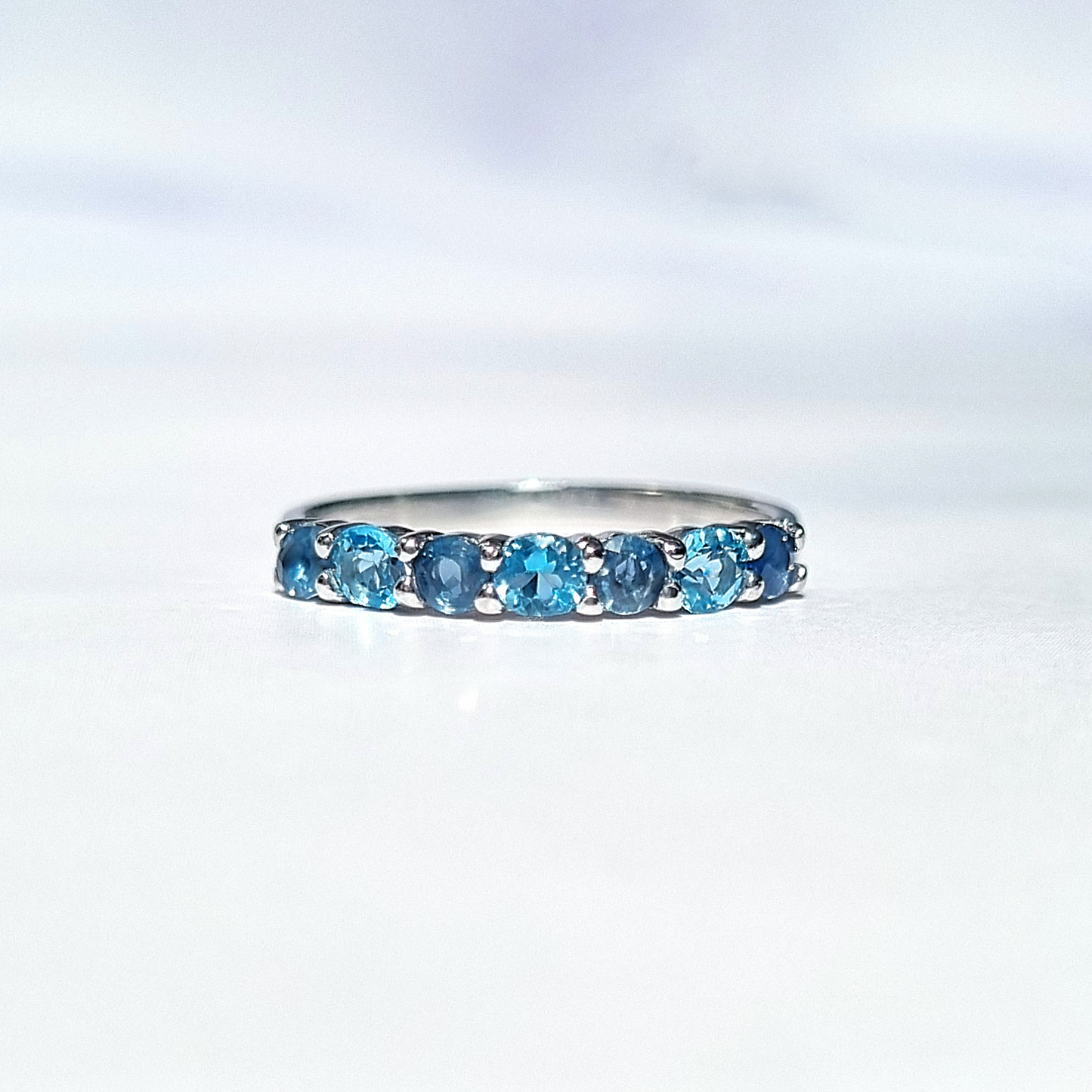 Blue Sapphire & Blue Topaz Half Eternity Band in Sterling Silver by Vianne Jewellery