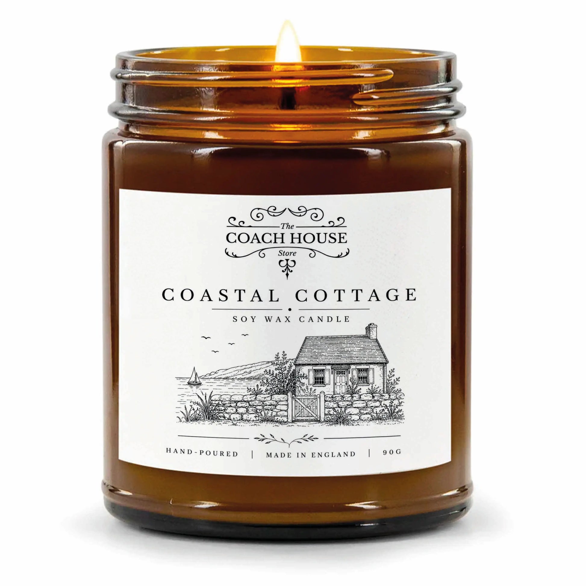 Coastal Cottage Soy Wax Candle in an amber glass jar with illustrated label