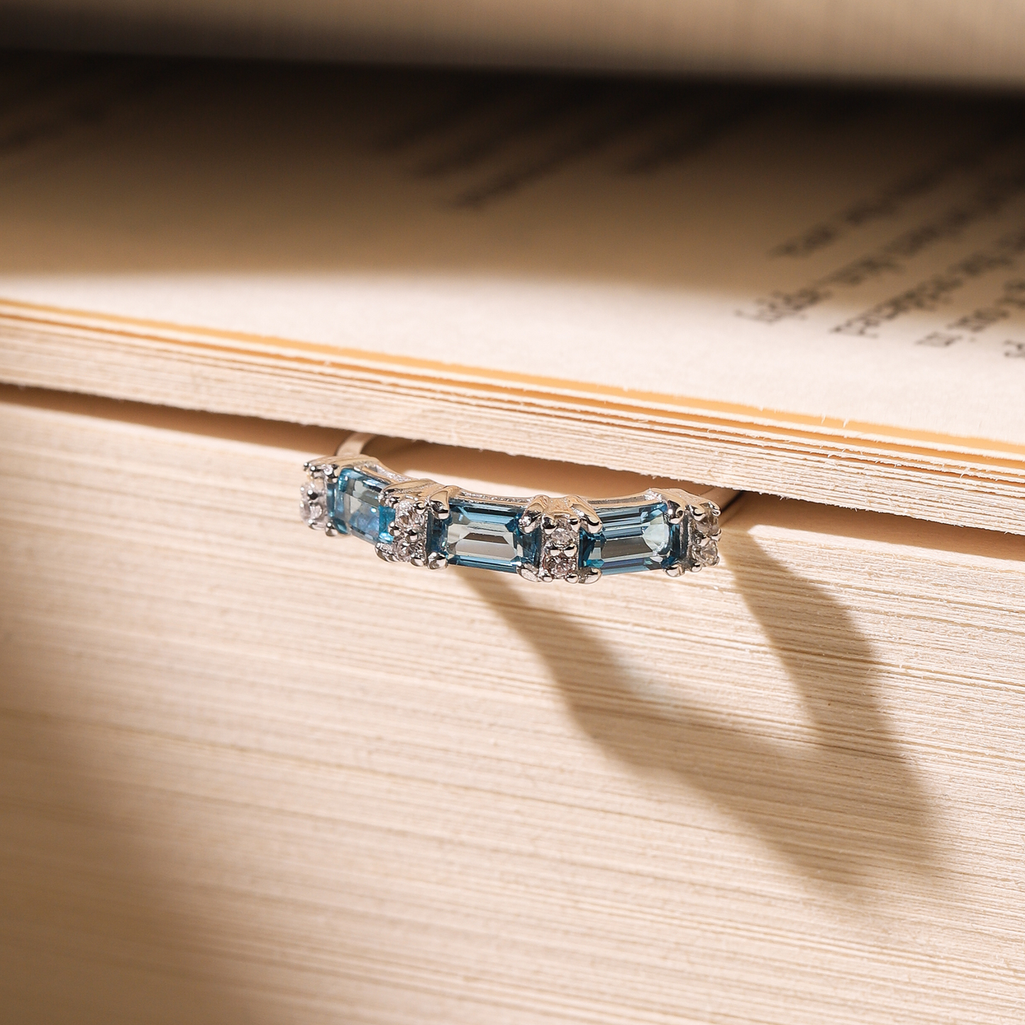 London Blue Topaz Emerald Cut Eternity Ring in Sterling Silver by Vianne Jewellery