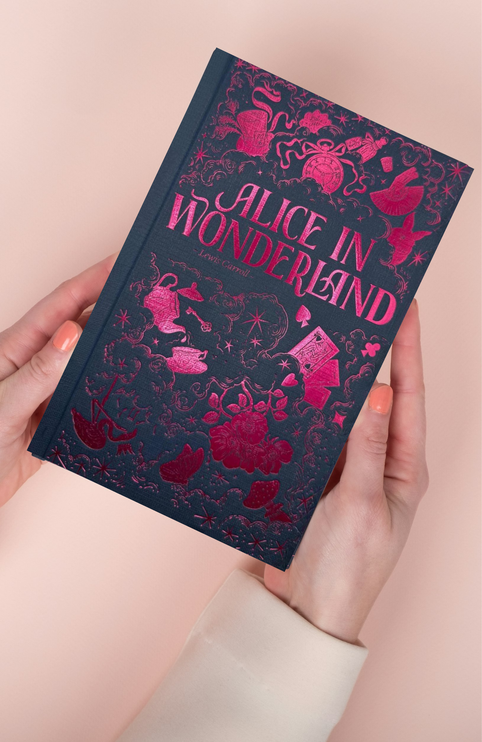 Alice in Wonderland Wordsworth Luxe Collection hardback by Lewis Carroll held in hands showing the decorative foil cover.