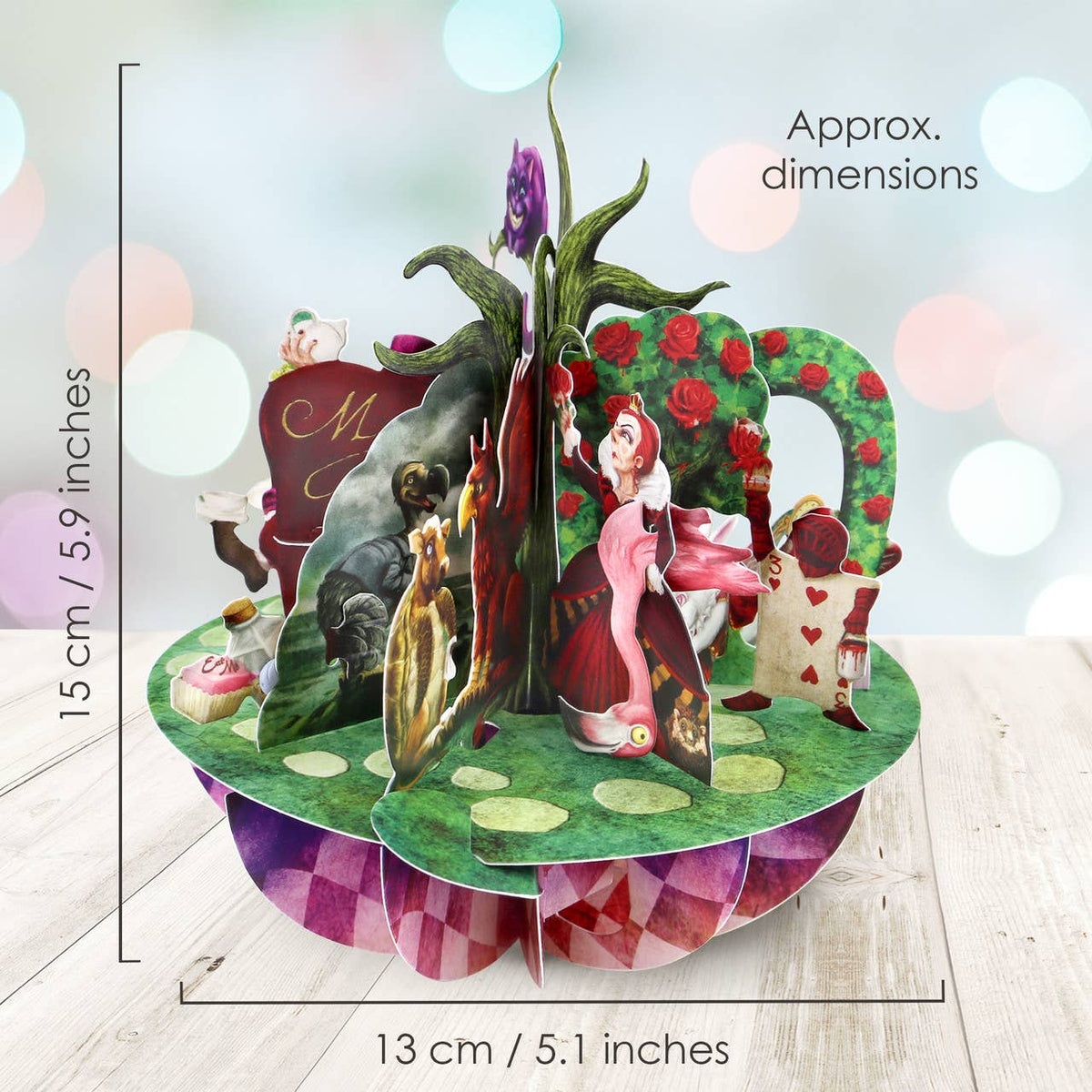 Alice in Wonderland Pirouette Card showing the 3D paper sculpture from the side with approximate dimensions of 15cm high and 13cm wide