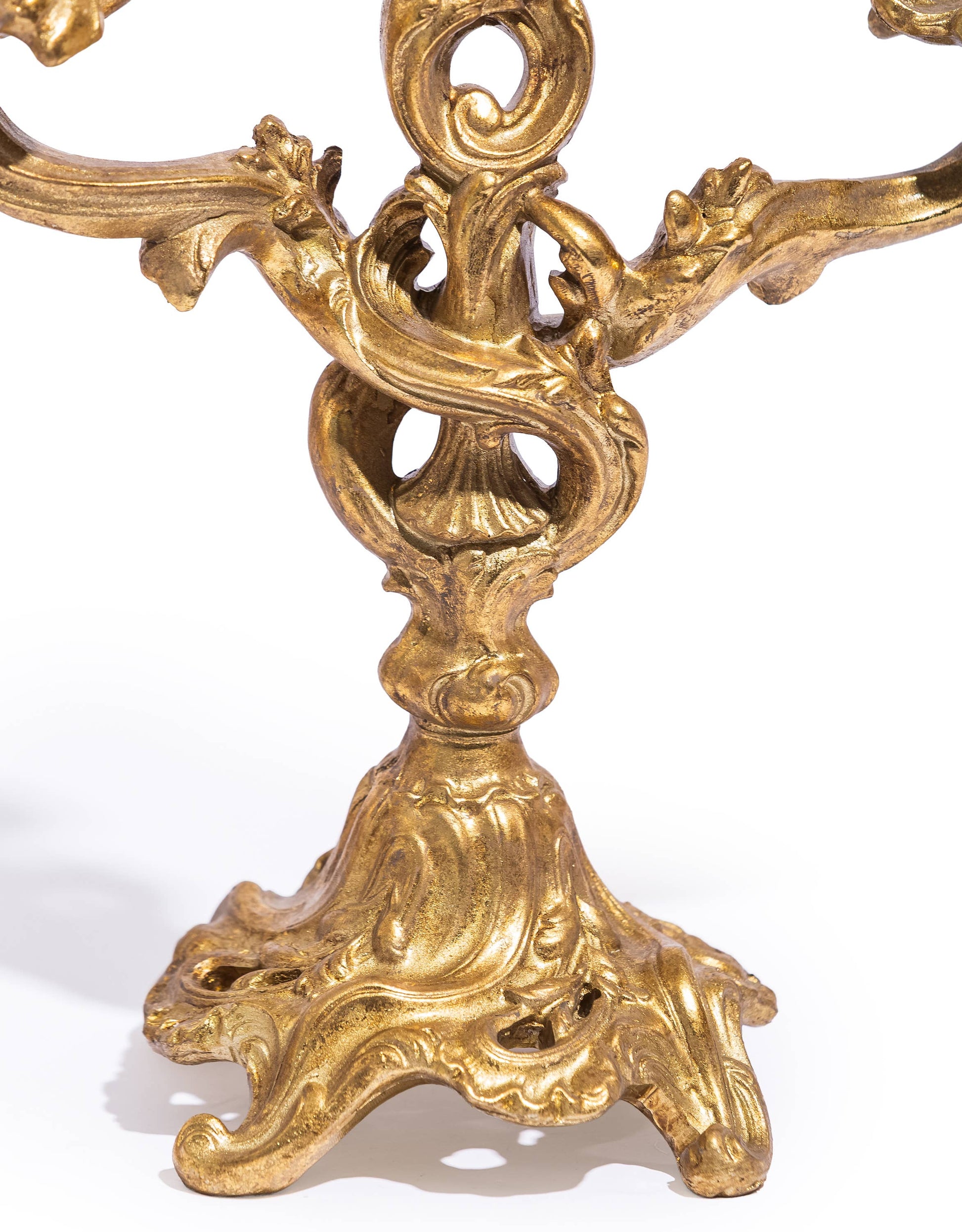 Antique Gold Ornate Candelabra close-up showing the decorative central stem and ornate footed base