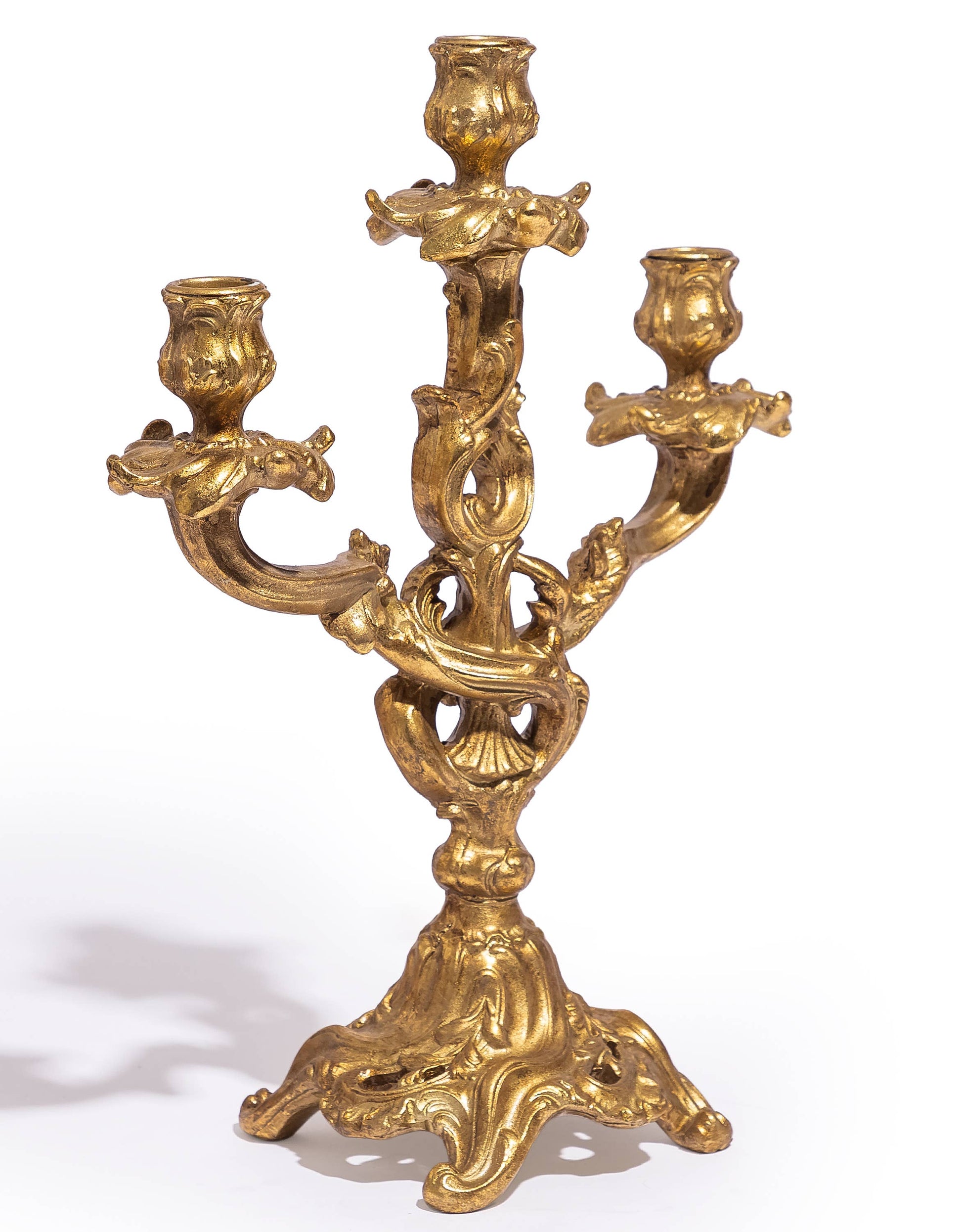 Antique Gold Ornate Candelabra with decorative three-arm design and scrolling gold detailing