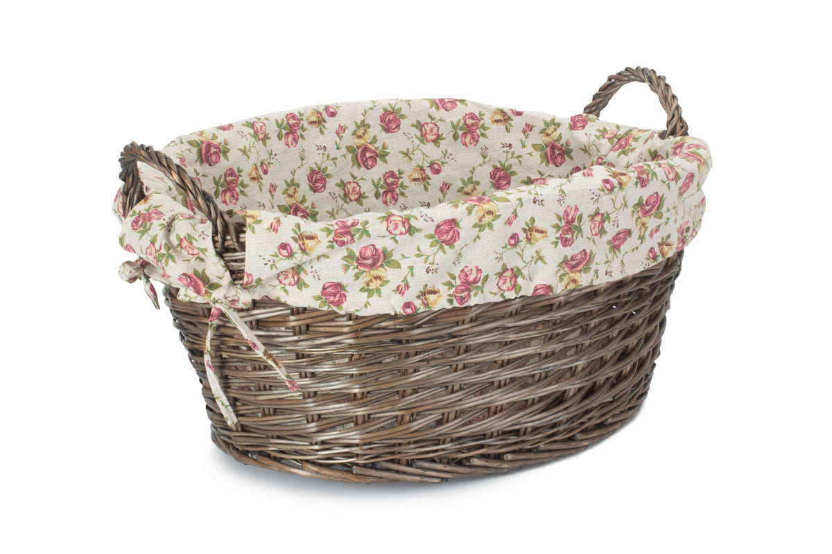Antique Wash Willow Laundry Basket with Garden Rose floral lining, oval woven basket design and sturdy side handles
