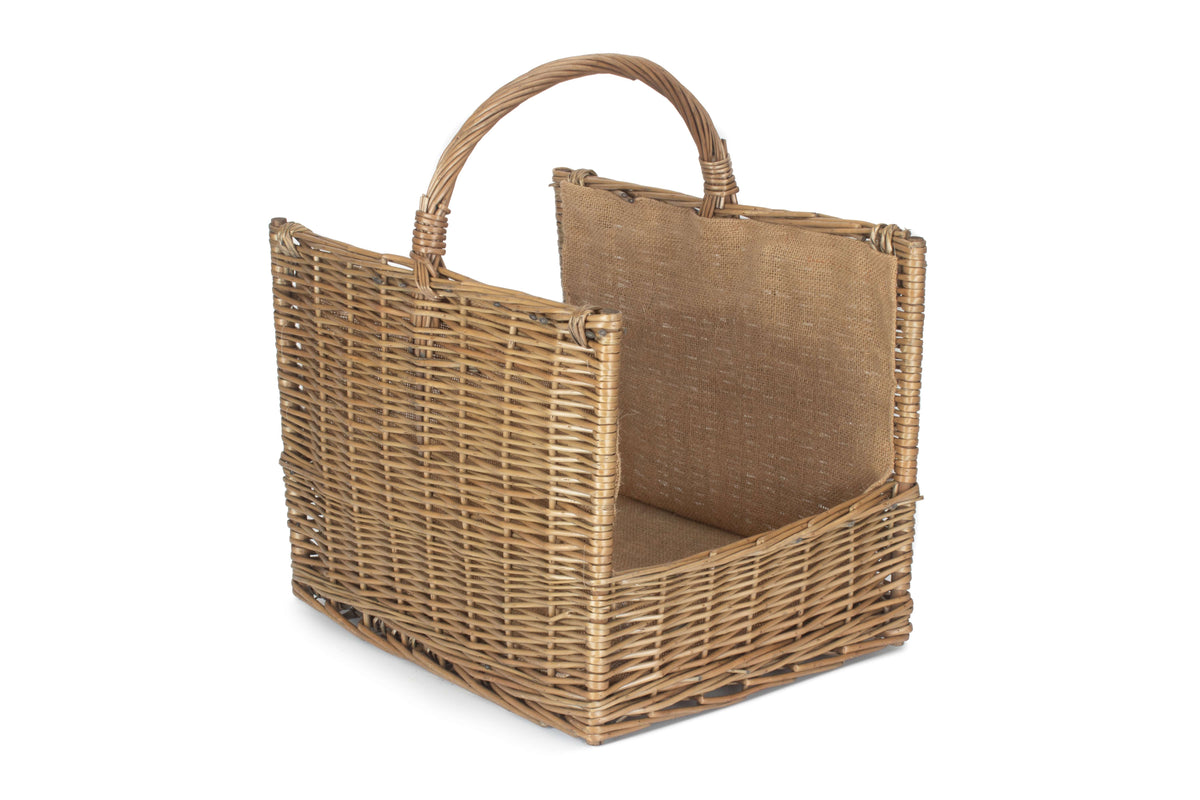 Antique wash willow open end log basket with natural hessian lining, viewed from an angle to show its shape