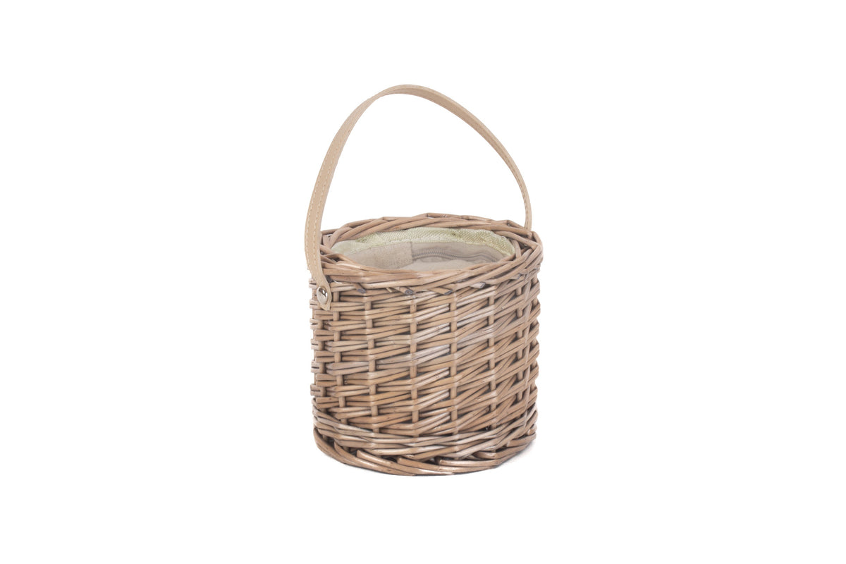 Antique Wash Willow Mini Ice Basket with woven wicker body and cream faux leather carry handle on a white background