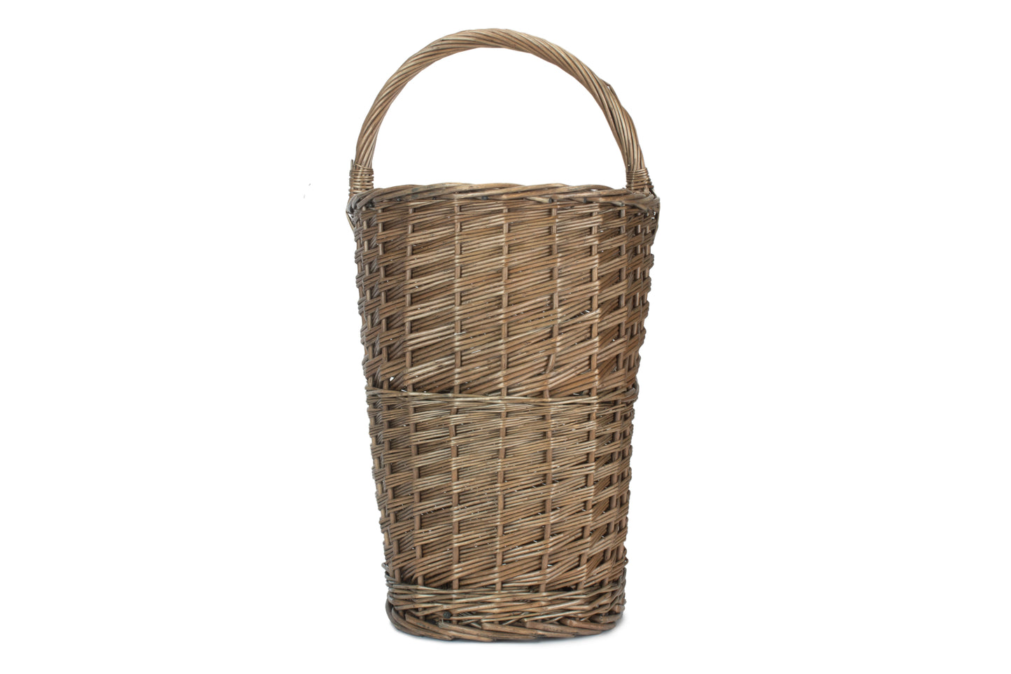 Front view of the antique wash willow stair basket with integrated carry handle.