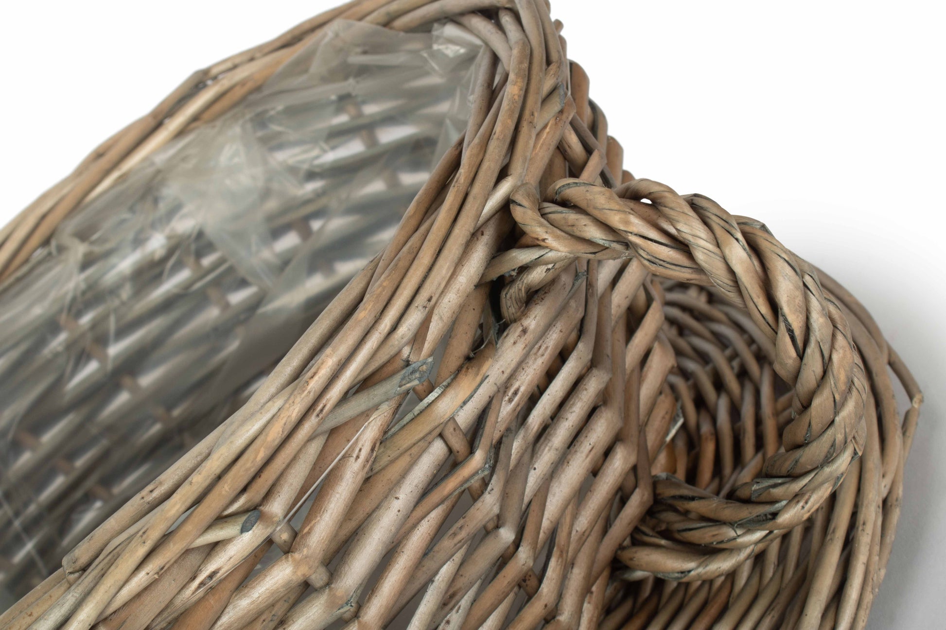 Antique Wash Willow Tea Cup Planter Basket close-up showing the natural woven willow, twisted handle and plastic lining