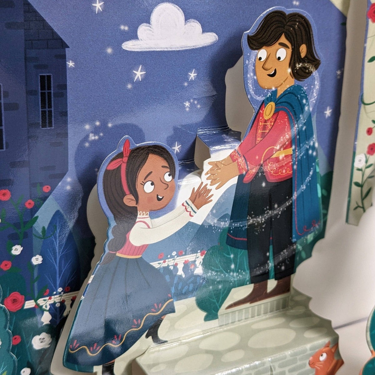 Beauty and the Beast children's pop-up book showing a close-up of the fairy tale characters in a three-dimensional scene