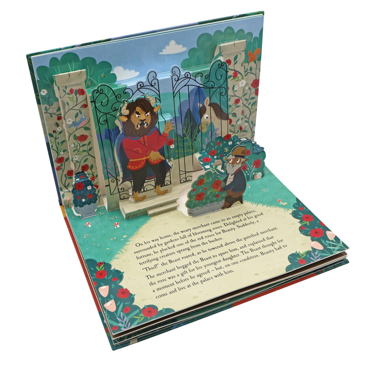 Beauty and the Beast pop-up book showing an illustrated three-dimensional scene inside the enchanted castle