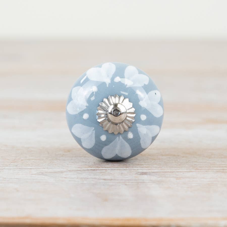 Front view of blue and white patterned ceramic door knob