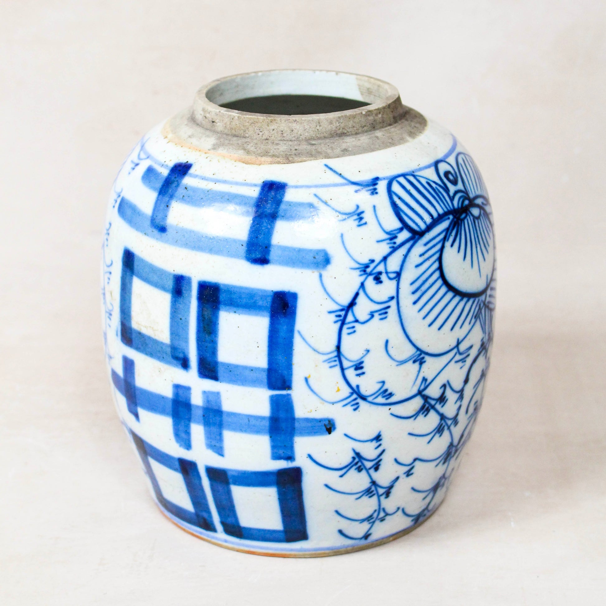 Antique Chinese blue and white porcelain jar with hand-painted cobalt decoration
