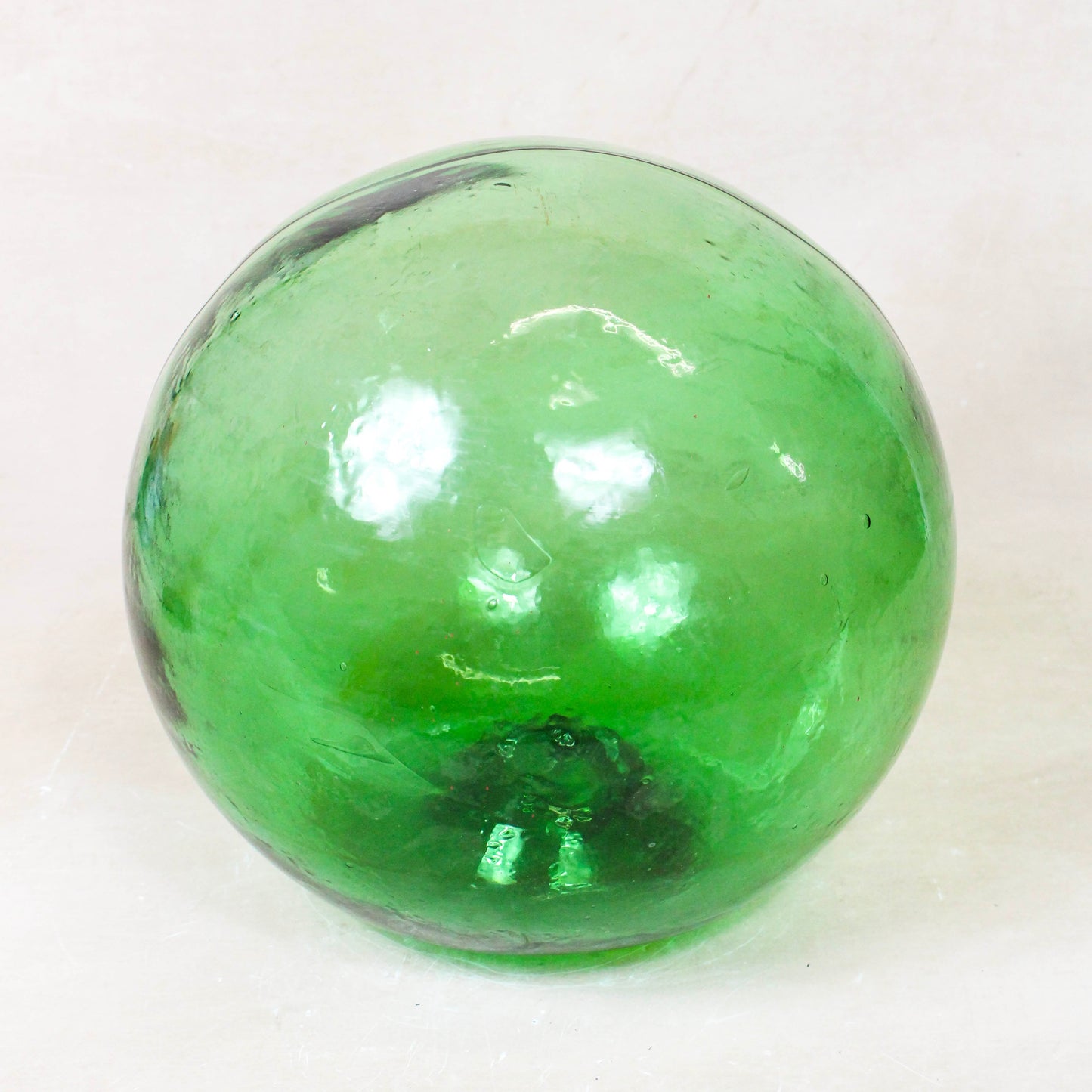 Antique emerald green hand-blown glass fishing buoy GB3 with natural bubbles and ripples
