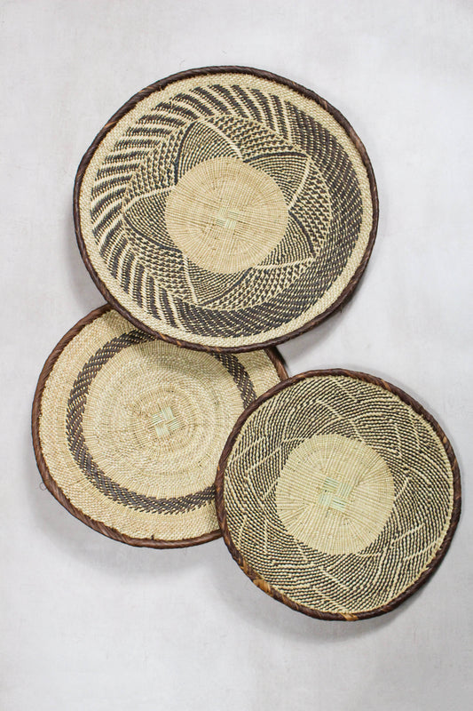 Set of three handwoven Tonga wall baskets No. 67 in naturally dyed Ilala palm
