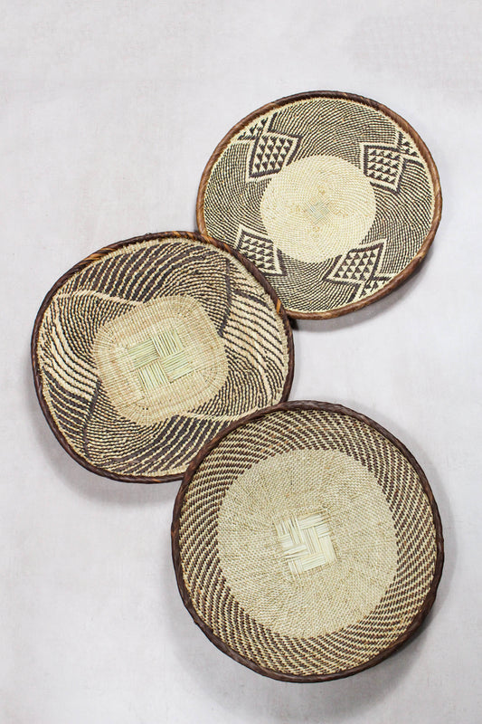 Set of three handwoven Tonga wall baskets No. 80 in naturally dyed Ilala palm
