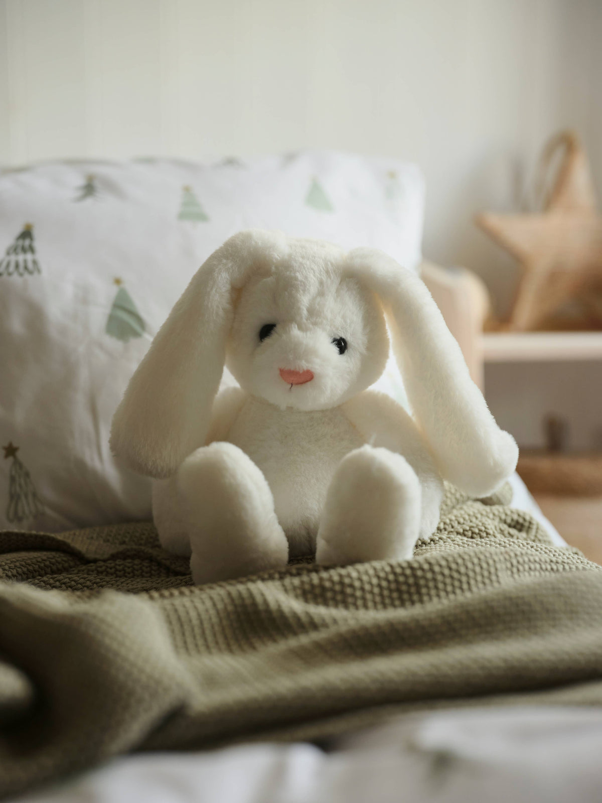 Charlie Bears Bramble Bunny white plush rabbit in a softly styled nursery