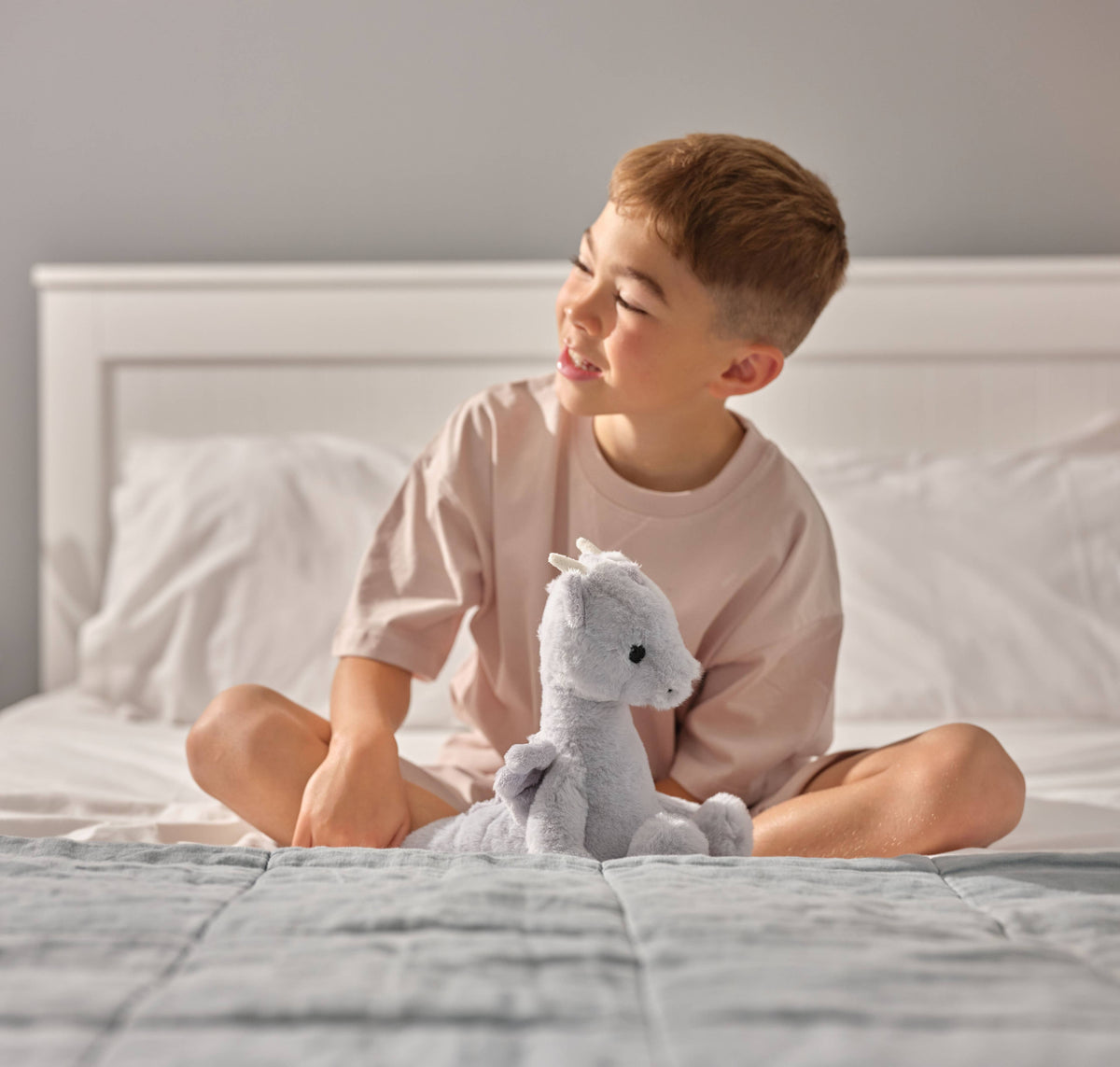 Charlie Bears Draco Dragon plush soft toy during imaginative playtime