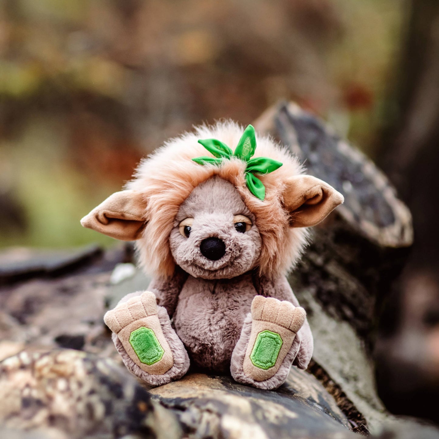 Charlie Bears Emerald Lou Bearhouse plush troll with honey-toned mane and green gemstone paw pads