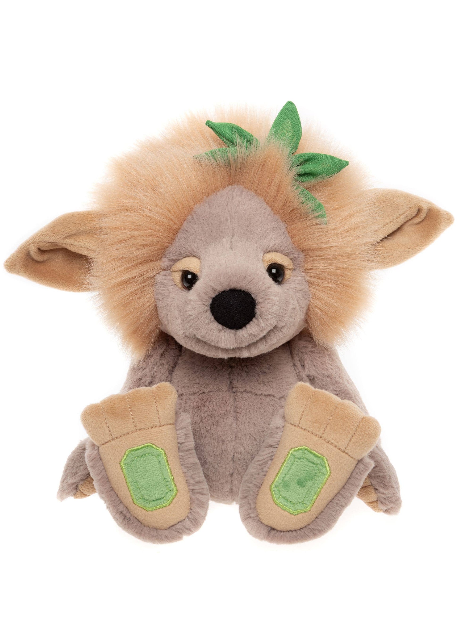 Front view of Charlie Bears Emerald Lou showing green gemstone paw pads and floral mane details