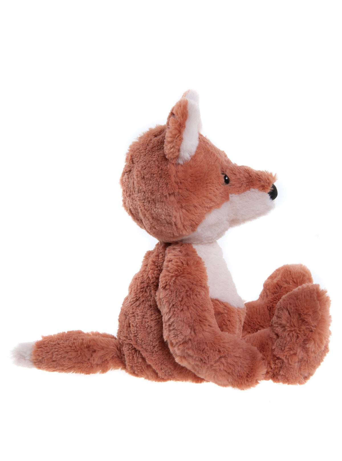 Side view of Charlie Bears Folly Fox showing orange plush and fluffy tail