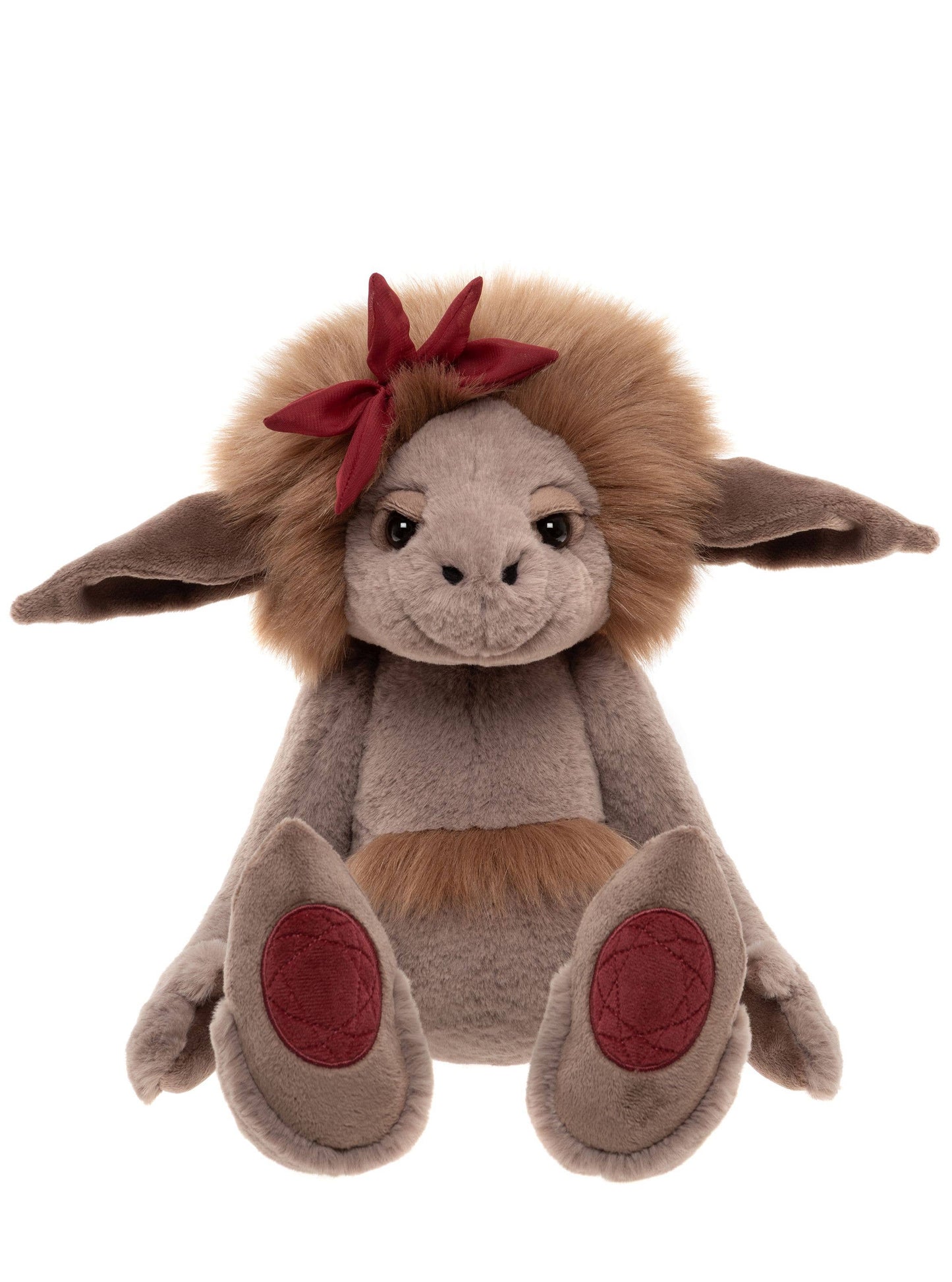 Front view of Charlie Bears Ruby Roo showing embroidered ruby gemstone paw pads
