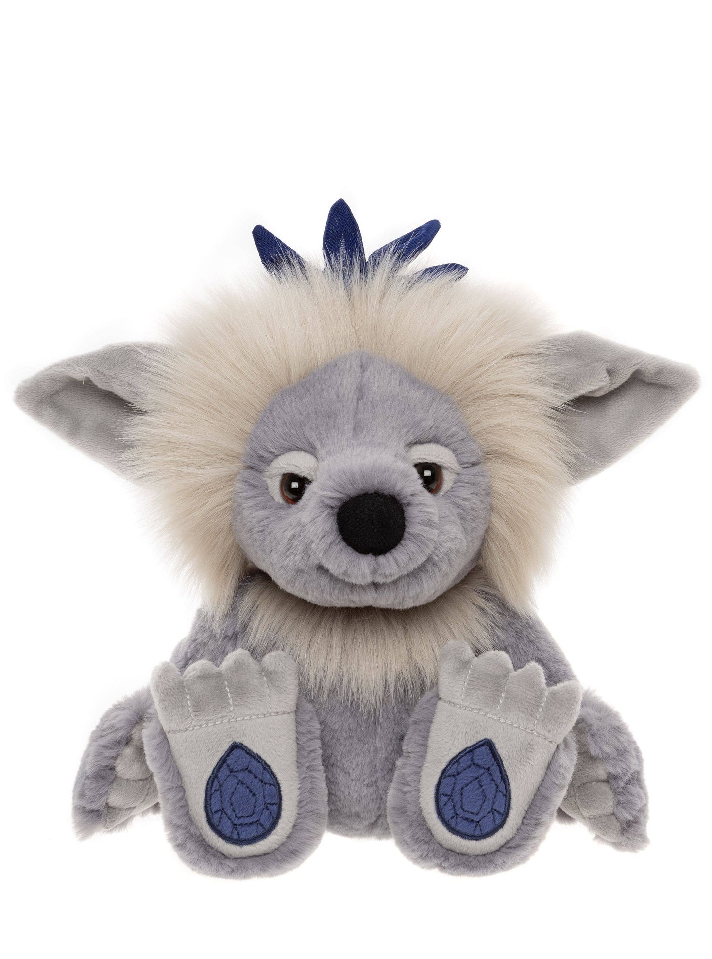 Front view of Charlie Bears Sapphire Sue showing embroidered sapphire gemstone paw pads and fluffy cream mane