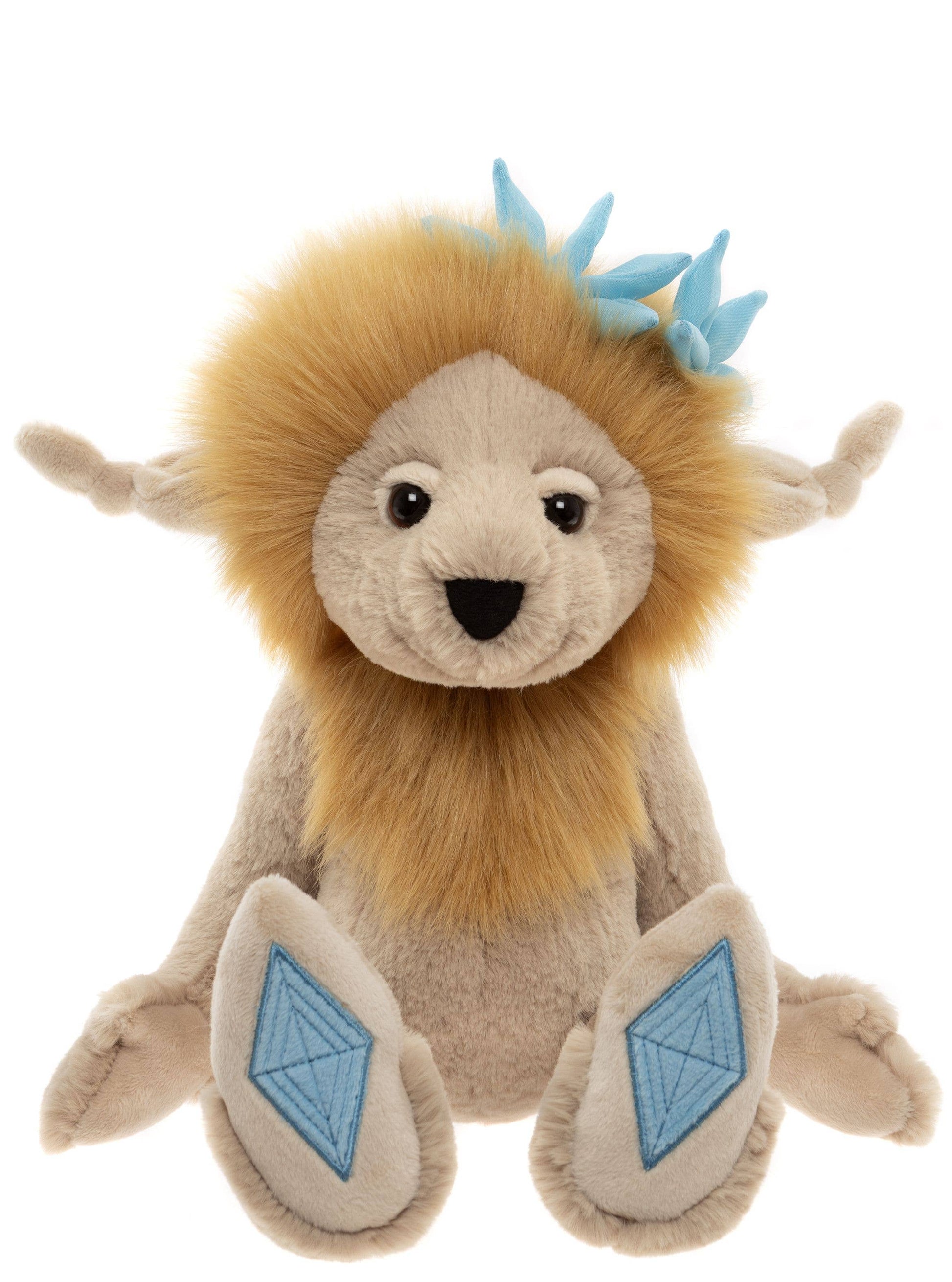 Front view of Charlie Bears Topaz Blu showing embroidered topaz gemstone paw pads and fluffy golden mane