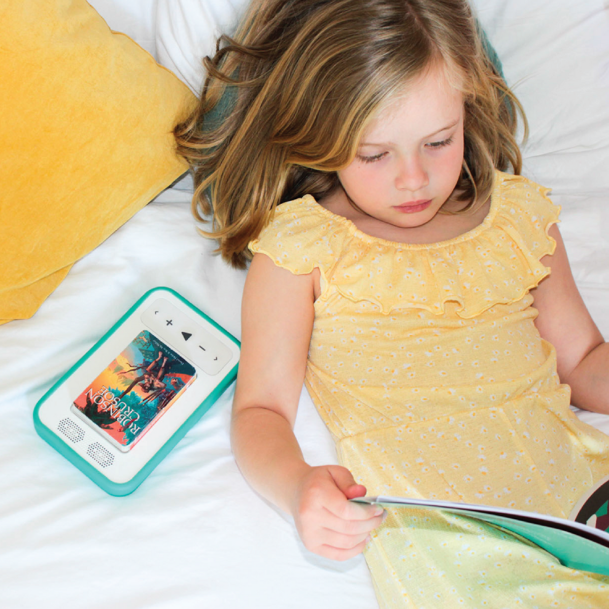 Child listening independently with a Voxblock audiobook player
