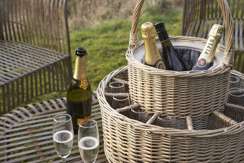Chilled Garden Party Willow Basket in use outdoors with bottles stored in the central chilled compartment