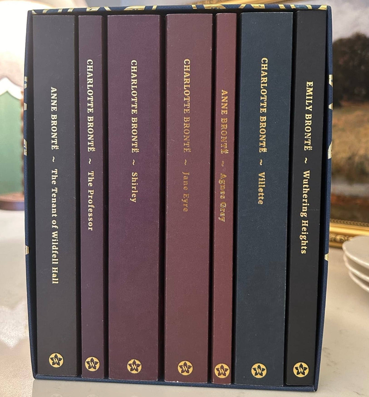 Seven paperback novels by Anne, Charlotte and Emily Brontë from The Complete Brontë Collection shown together