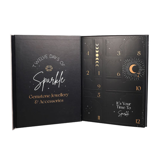 12-Day Crystal Jewellery Advent Calendar opened to show the black and gold design with twelve numbered compartments