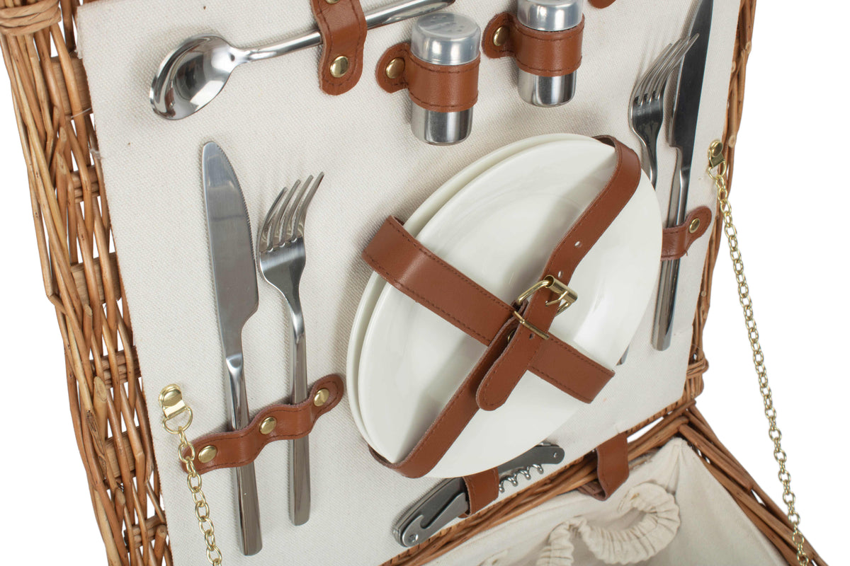 Fitted stainless steel cutlery secured inside the cream-lined willow picnic hamper