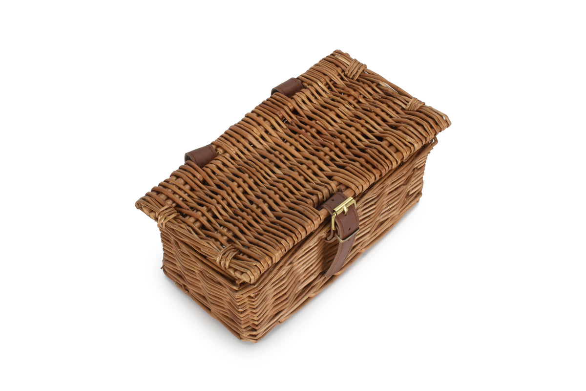 Closed woven willow mug carrier with tan strap from the Deluxe 2 Person Willow Picnic Hamper