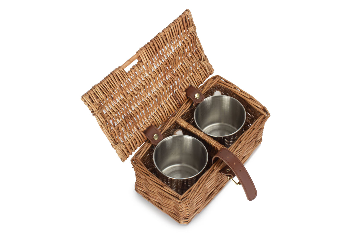 Open woven willow mug carrier holding two stainless steel mugs from the Deluxe 2 Person Willow Picnic Hamper