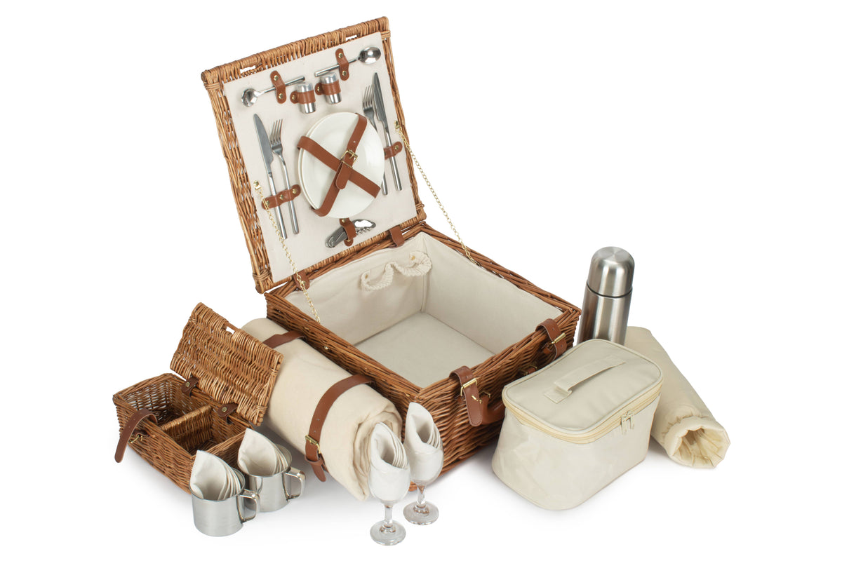 Open two person willow picnic hamper showing fitted dining accessories and cream picnic essentials