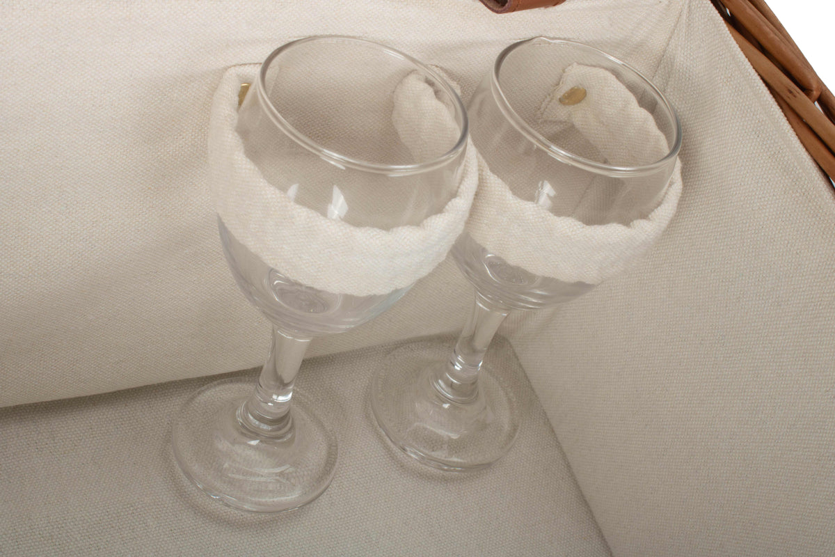 Two wine glasses secured inside the cream-lined Deluxe 2 Person Willow Picnic Hamper