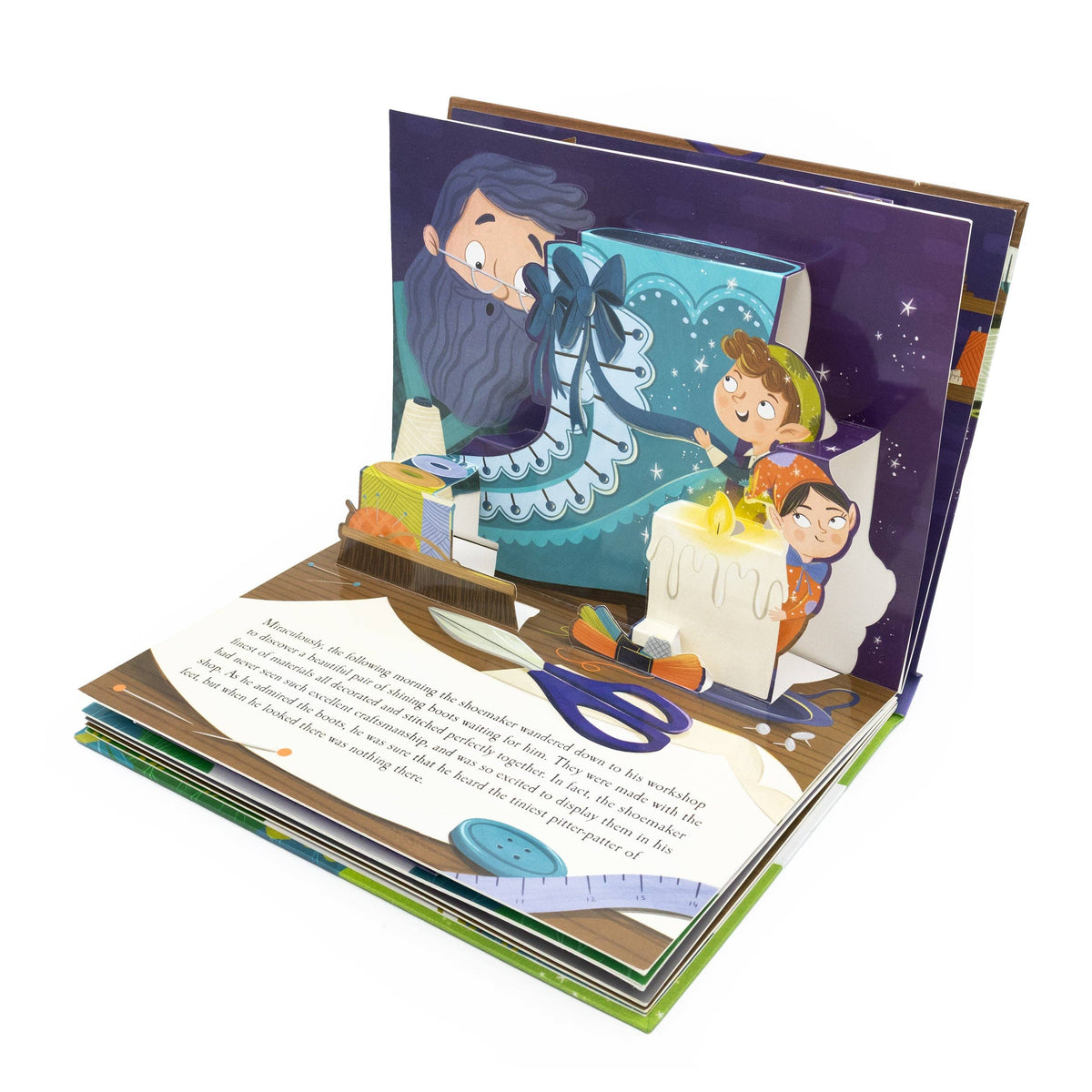 The Elves and the Shoemaker pop-up book opened to reveal a colourful three-dimensional fairy tale scene