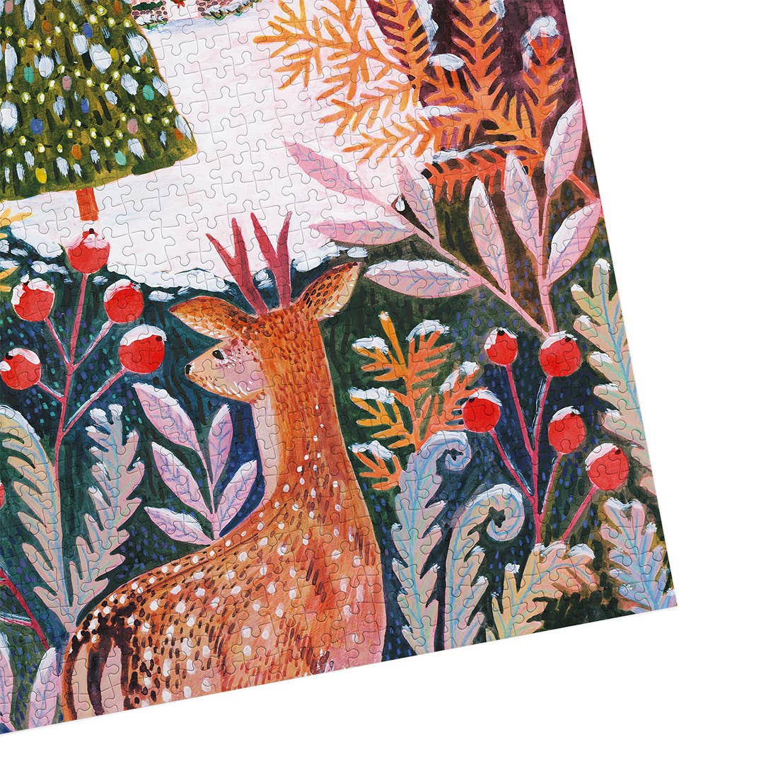 Frosty Fauna Gibsons jigsaw puzzle shown at an angle, highlighting the deer illustration and intricate botanical details of the assembled pieces.